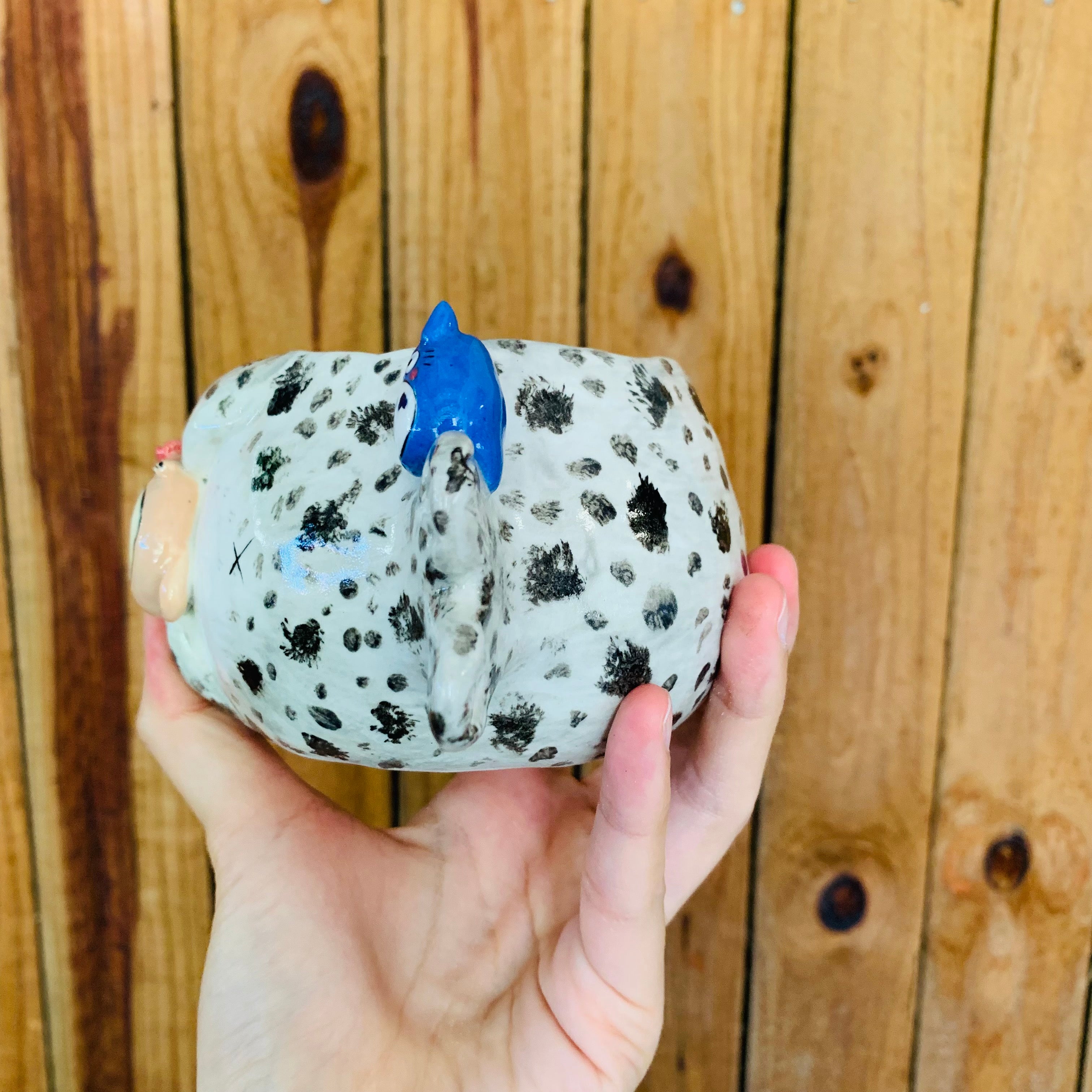 Chubby spotted seal with Totoro friends pot