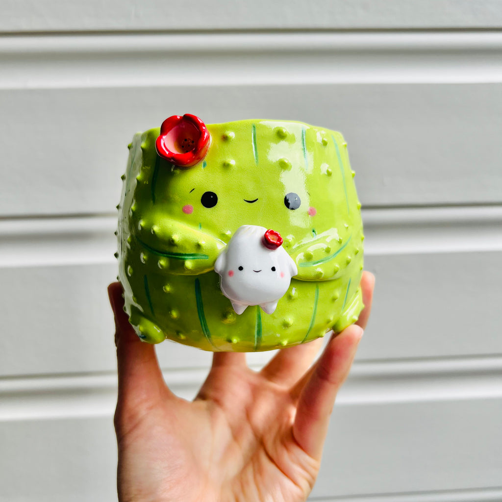 Flowery cactus pot with dumpling friend