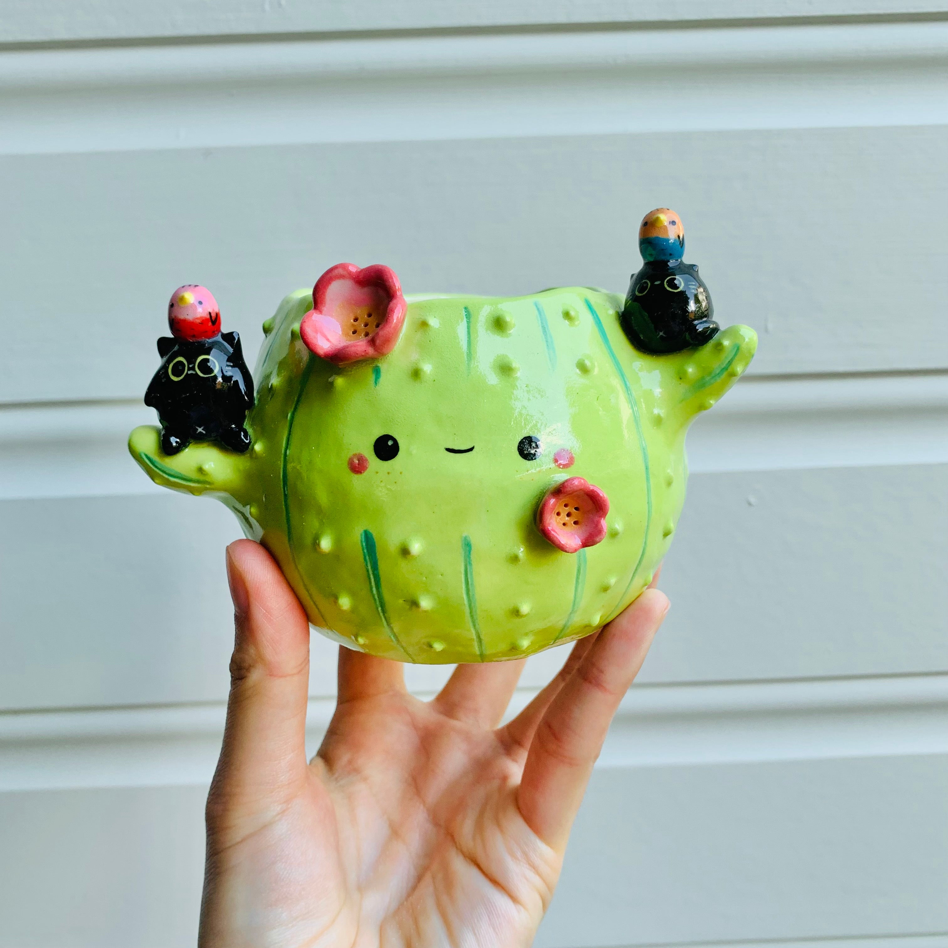 Flowery cactus pot with black cats and bird friends