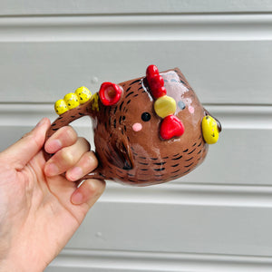 Brown chicken mug with chicks