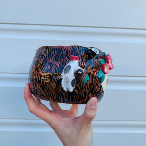 Happy flowery tree with bees, cat and pink galah planter