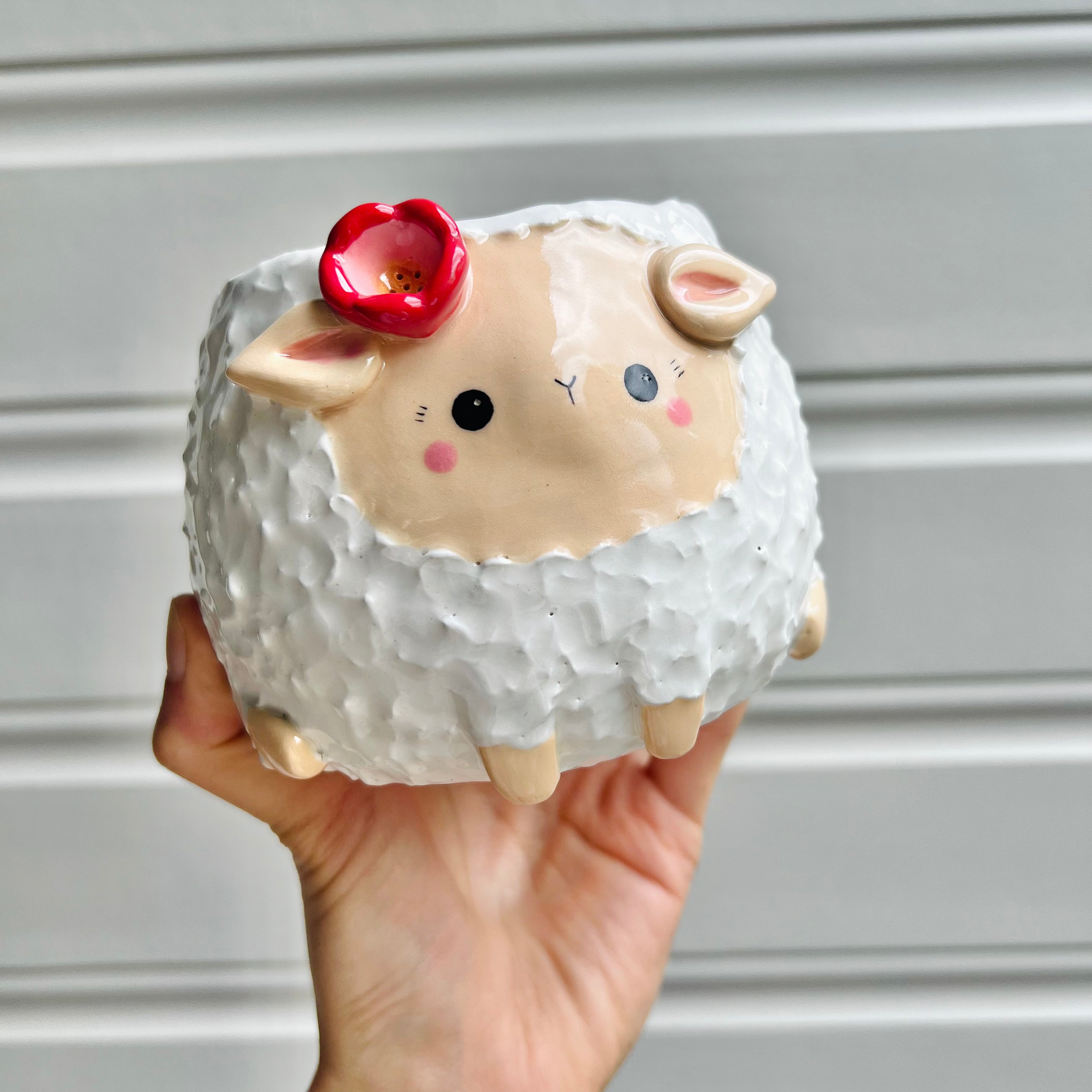 Flowery sheep pot