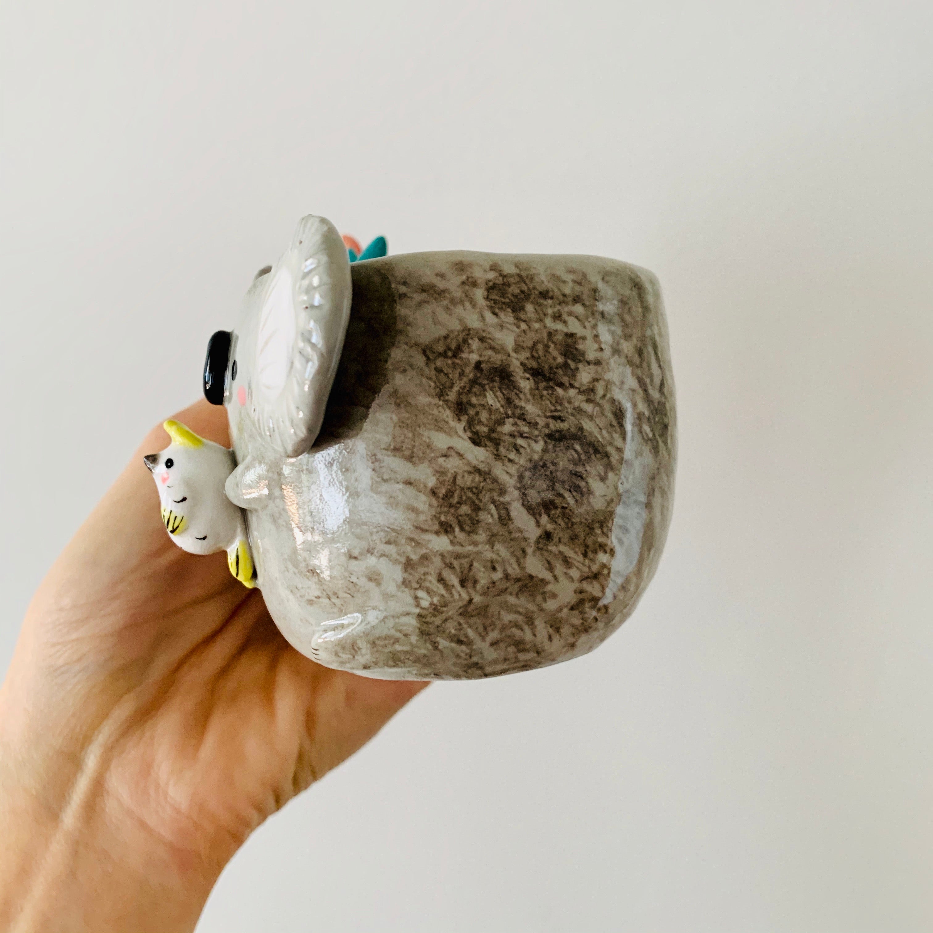 Koala with cockatoo friend mug