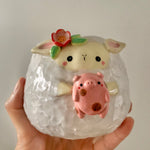 Flowery lamb pot with pig friend