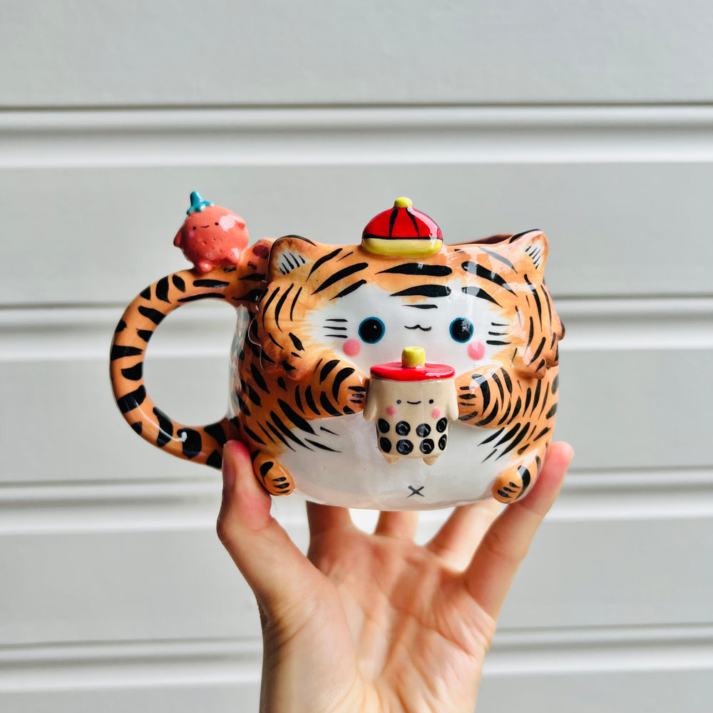 Hat wearing tiger with mandarin friend mug with bubble tea, photo 1 of 5