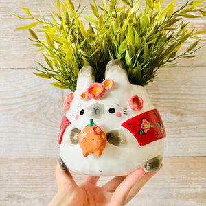 LNY CAPE WEARING Bunny pot with mandarin friend