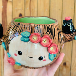 Happy tree pot with black cat friends