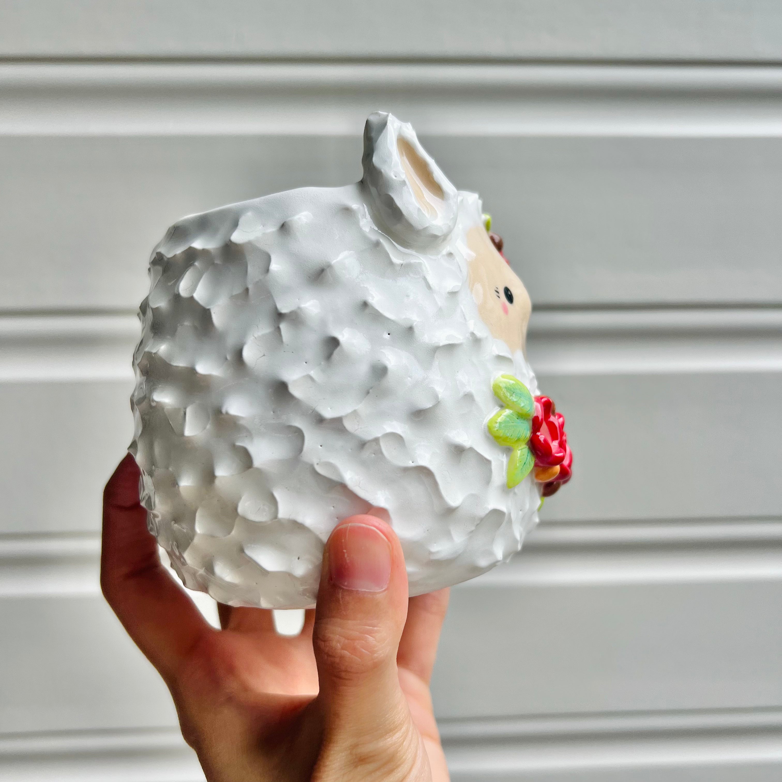 Flowery llama pot