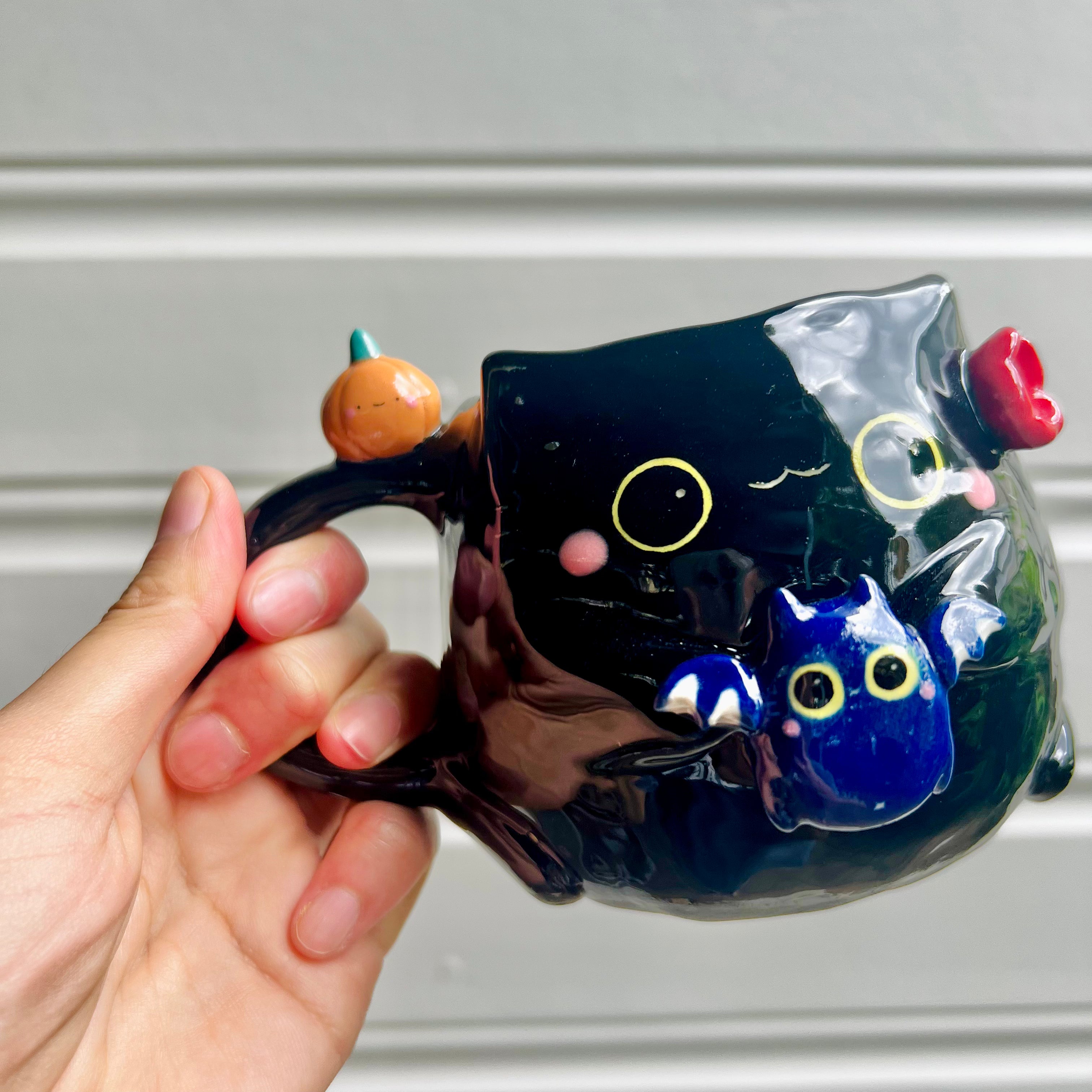 Halloween black cat mug with bat friend