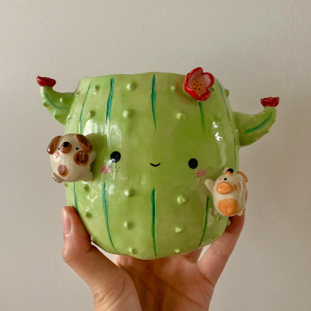 Flowery cactus pot with doggo friends