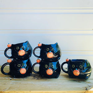 Black cat mug with pumpkin friends