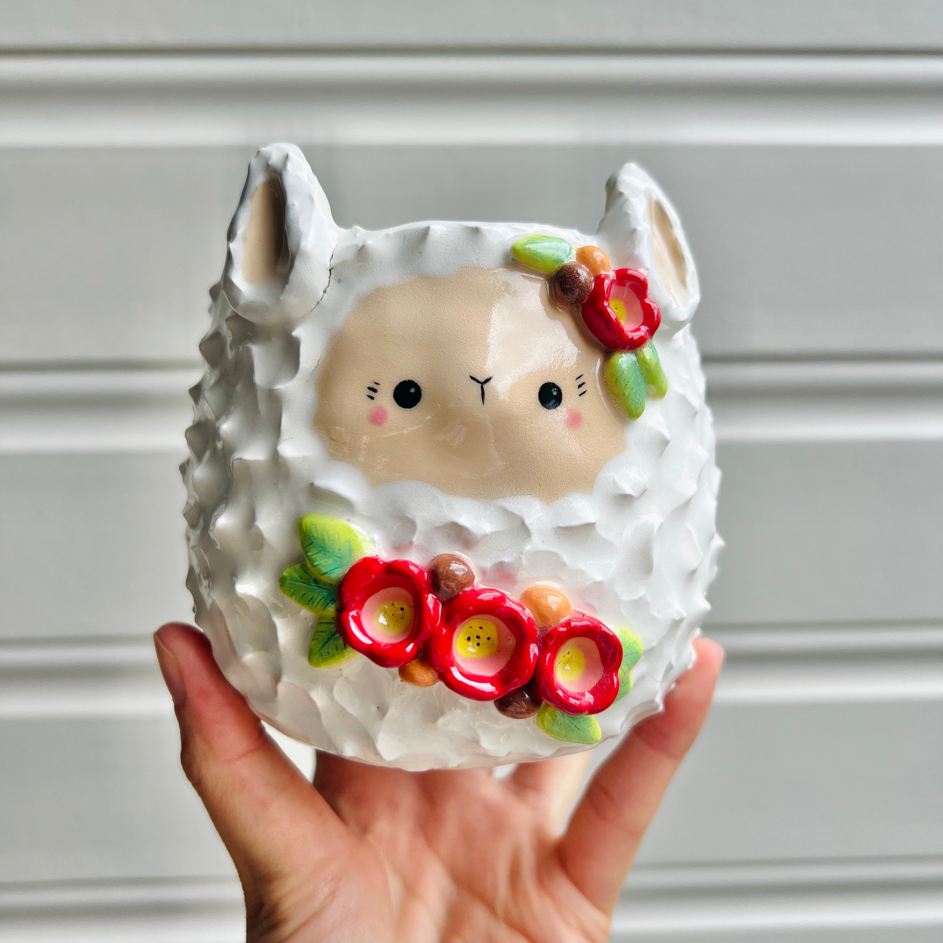 Flowery llama pot