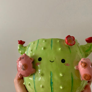 Flowery cactus pot with pig friends