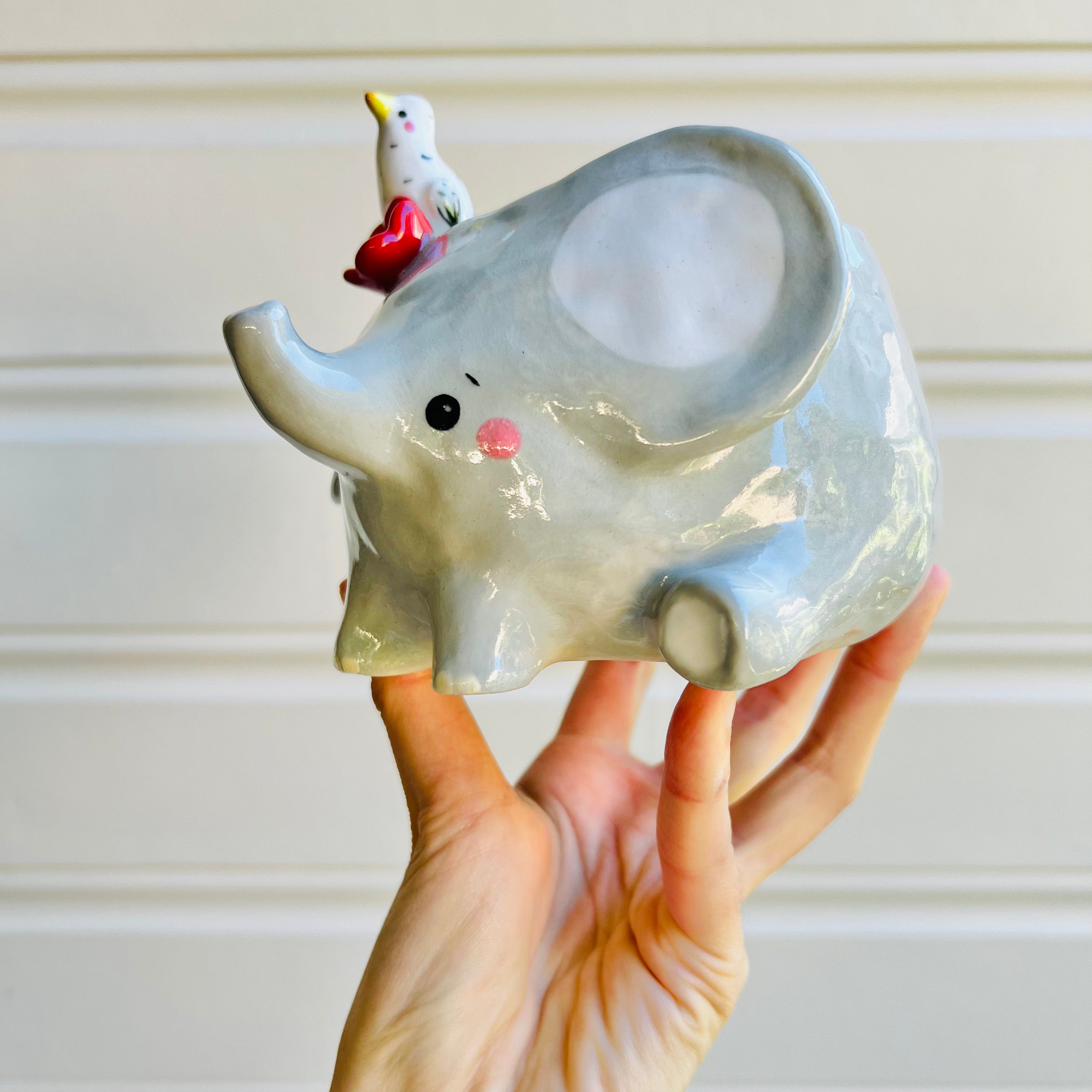 Elephant pot with egret friend