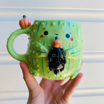 Pumpkin cactus mug with black cat friend