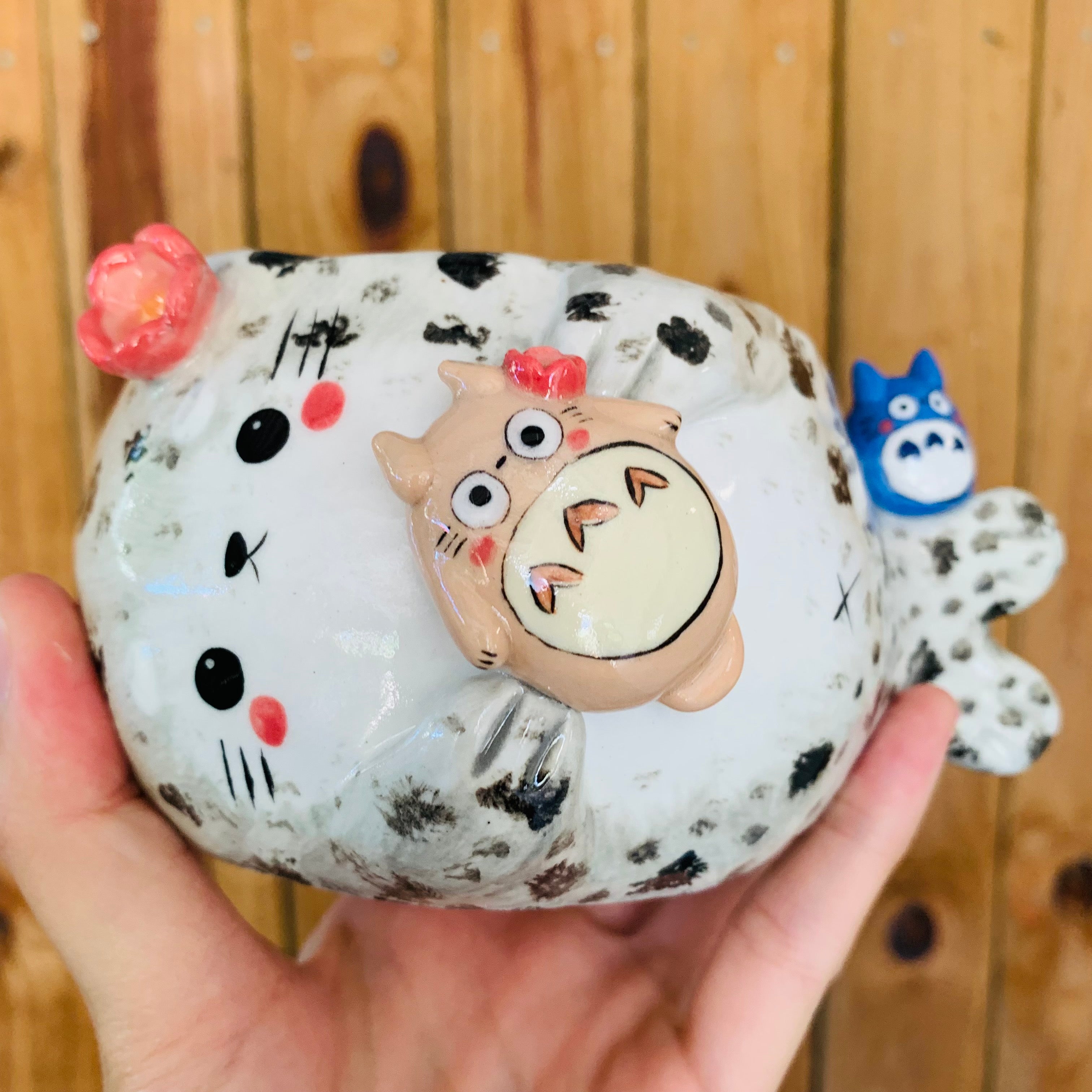 Chubby spotted seal with Totoro friends pot