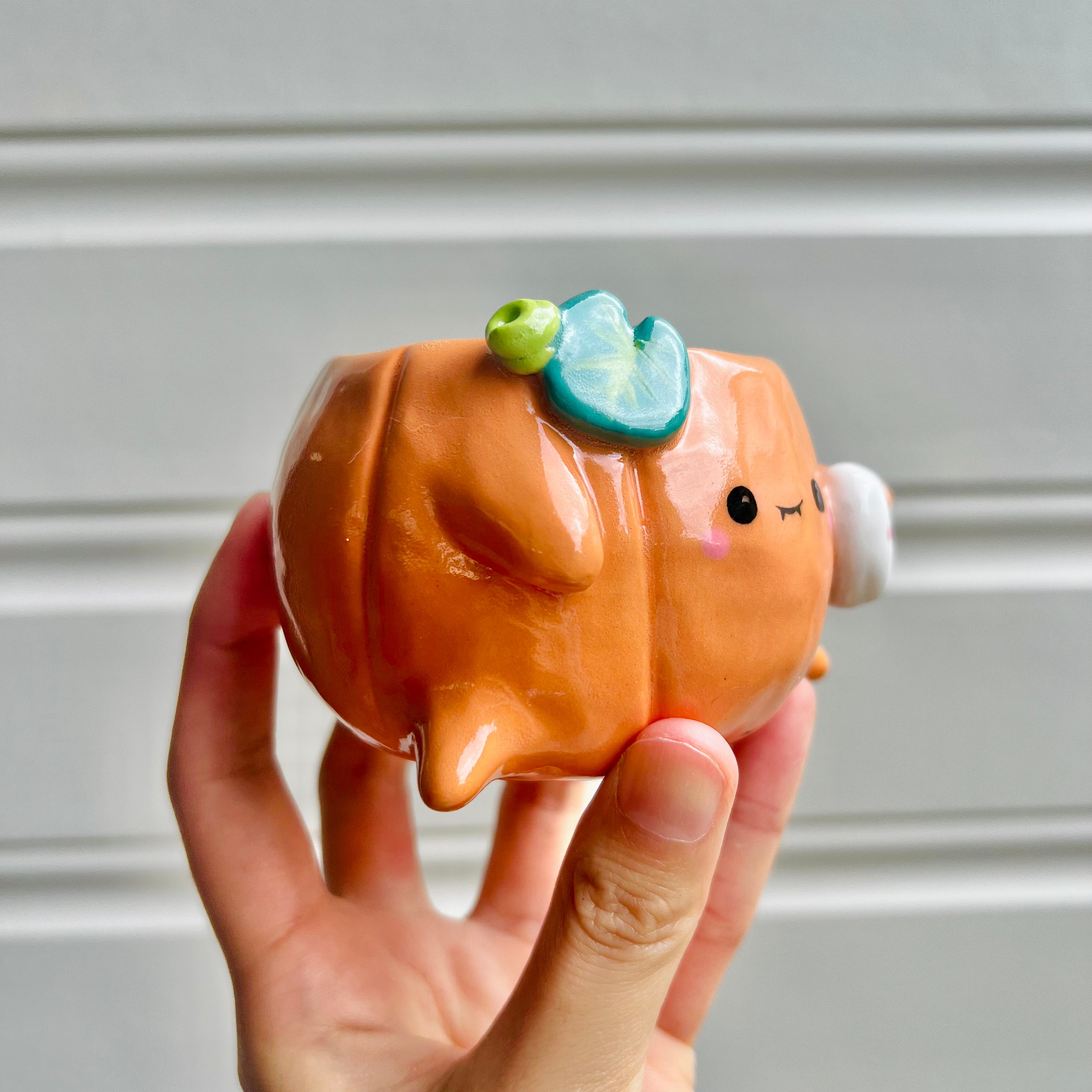 Small Halloween pumpkin pot with ghost friend