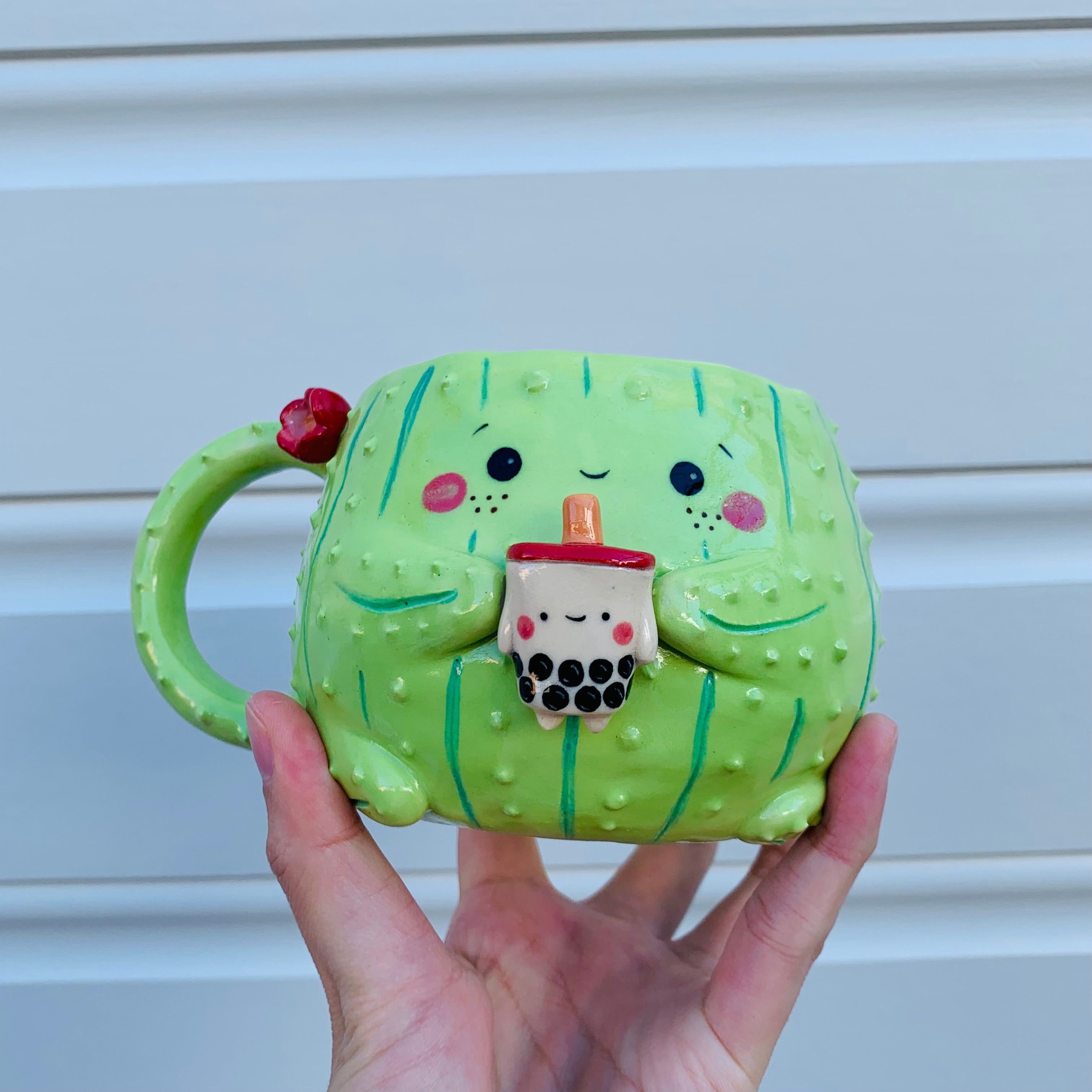 Light green flowery cactus mug with bubble tea friend