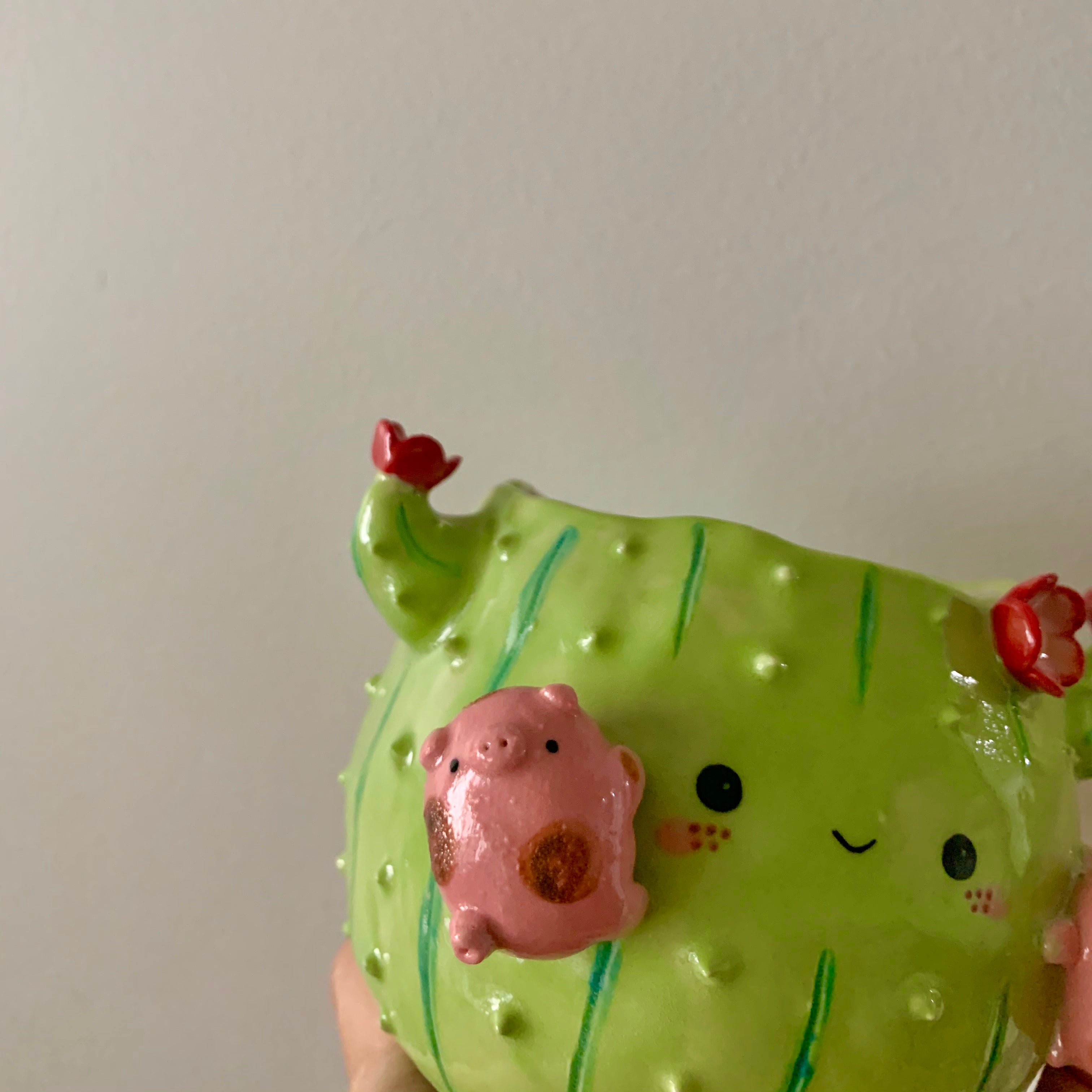 Flowery cactus pot with pig friends