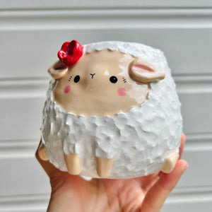 Flowery sheep pot