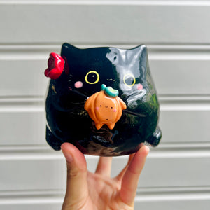 Halloween black cat pot with pumpkin friend