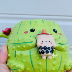 Light green flowery cactus with bubble tea friend