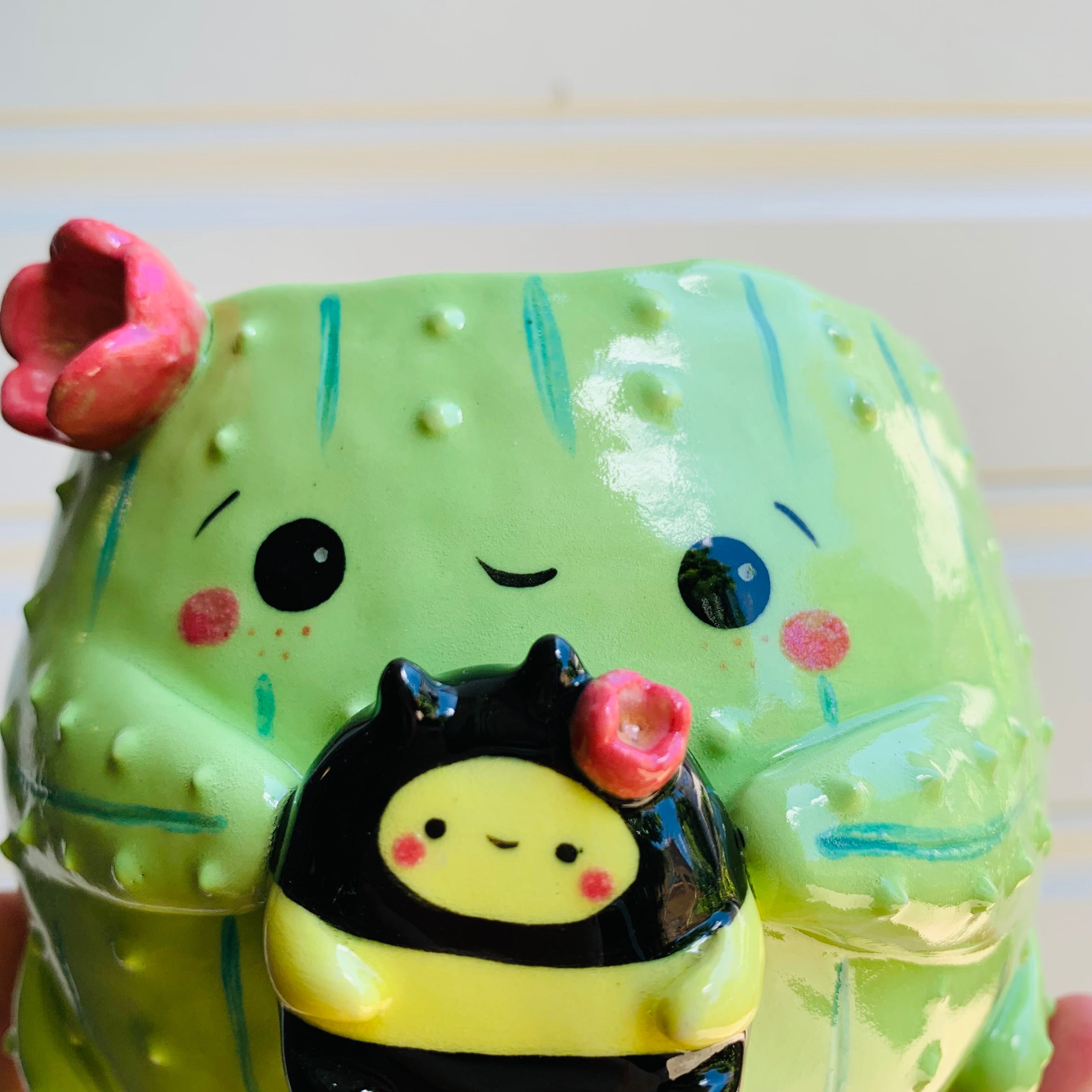 Flowery cactus pot with bee friend