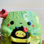 Flowery cactus pot with bee friend