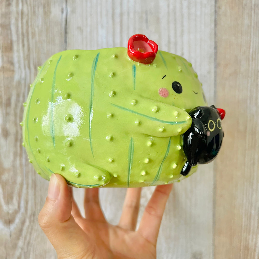 Flowery cactus pot with black cat friend, photo 2 of 7