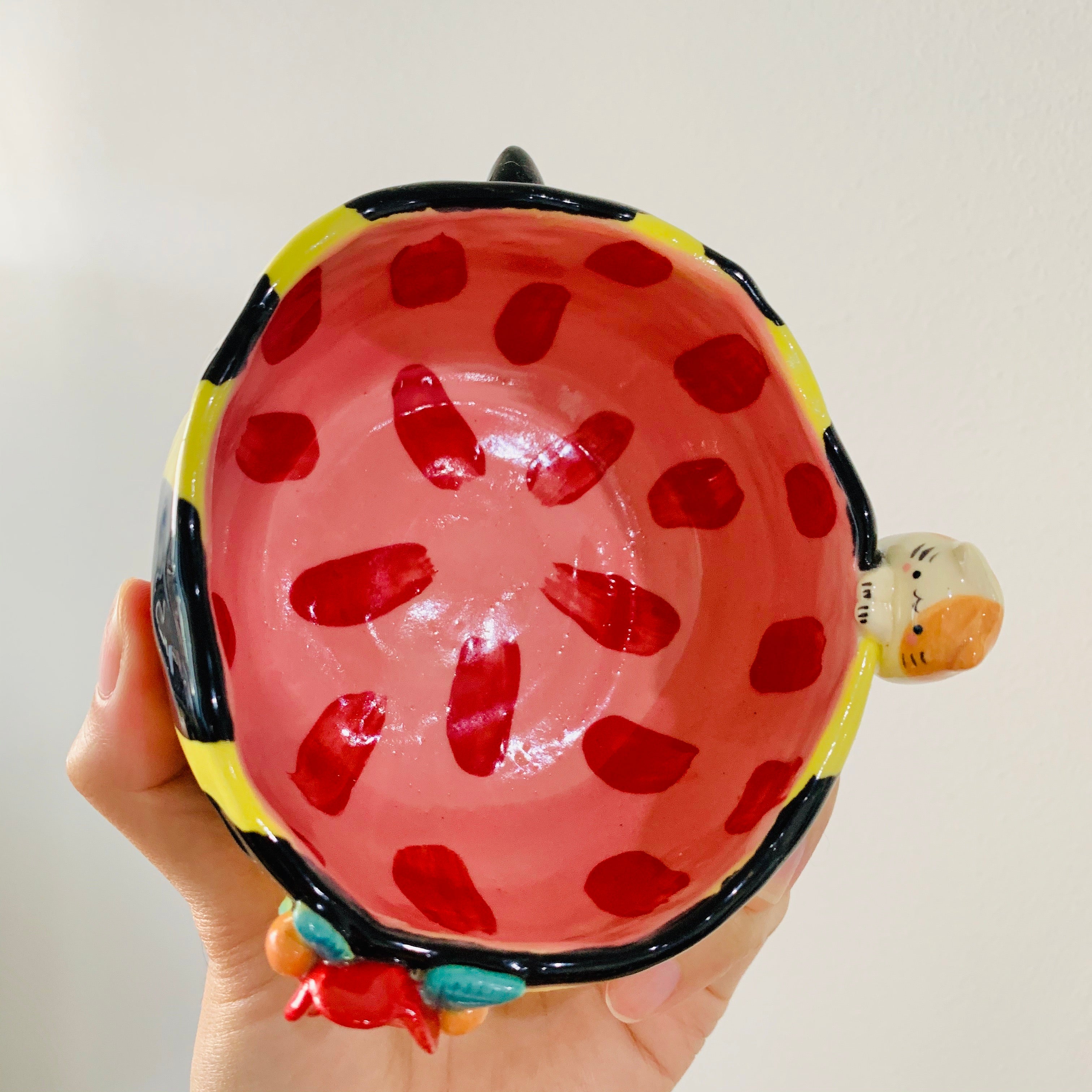 Flowery bee snack bowl with cat friend