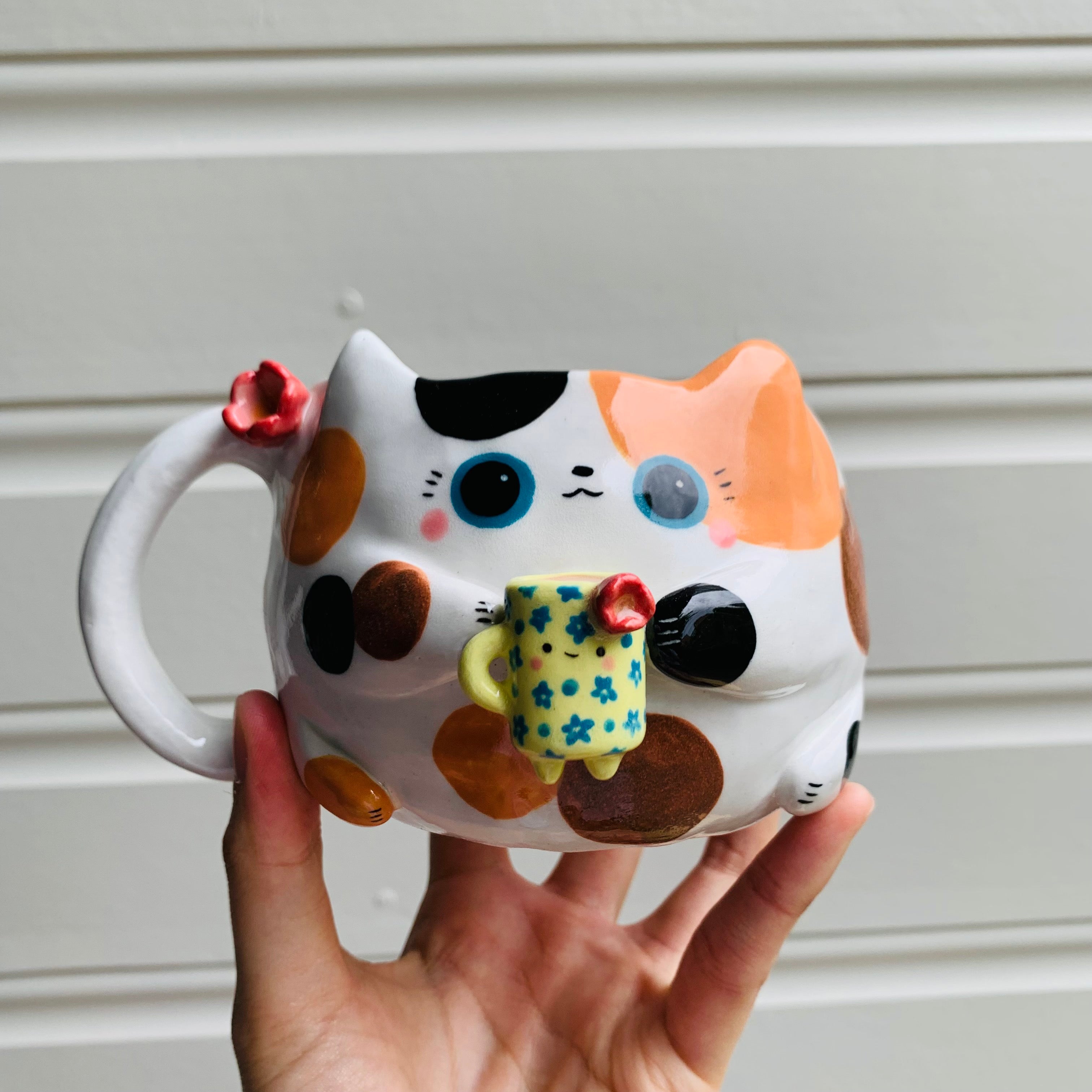 Spotty KITTY coffee pun mug with mug friend