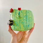 Flowery cactus pot with bee friends