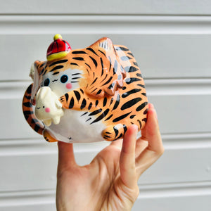 Hat wearing tiger mug with dumpling friends