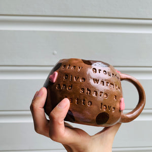 Brown DOGGO coffee pun mug with mug friend