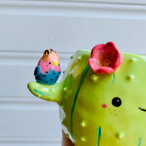 Flowery cactus pot with bird friends