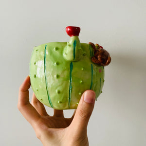 Flowery cactus pot with sloth friend