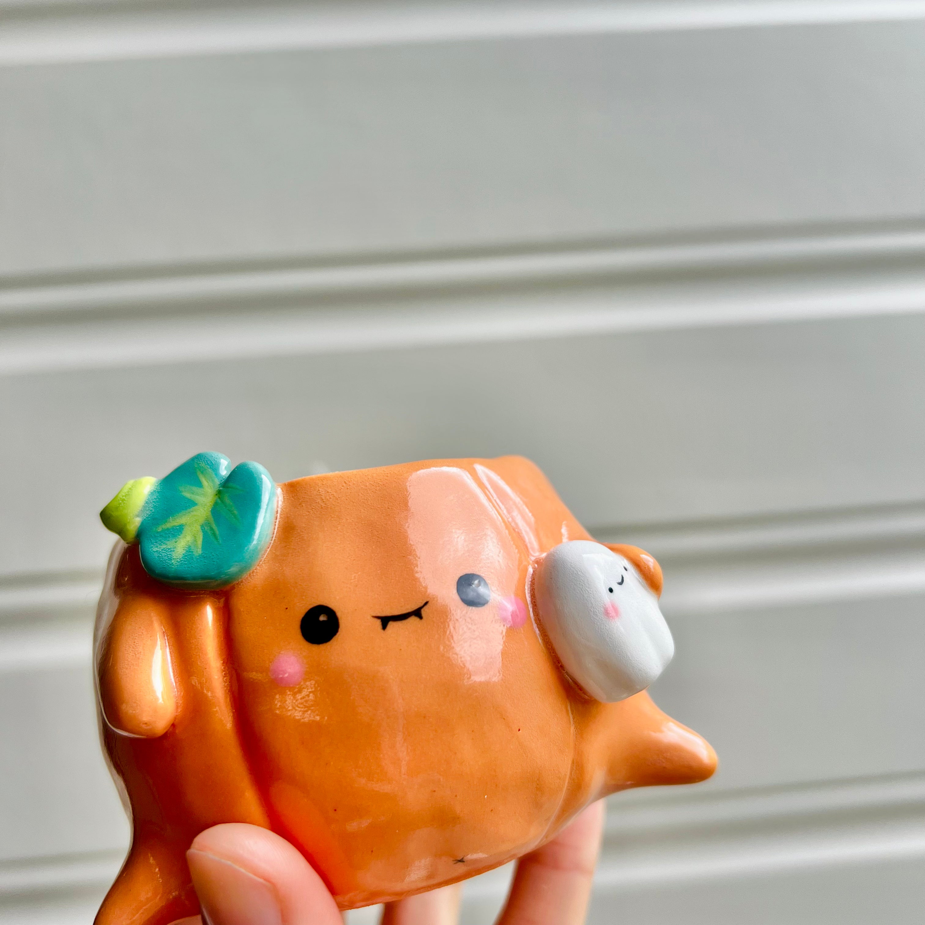 Small Halloween pumpkin pot with ghost friend