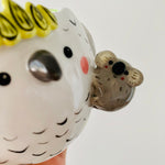 Cockatoo with koala friend pot