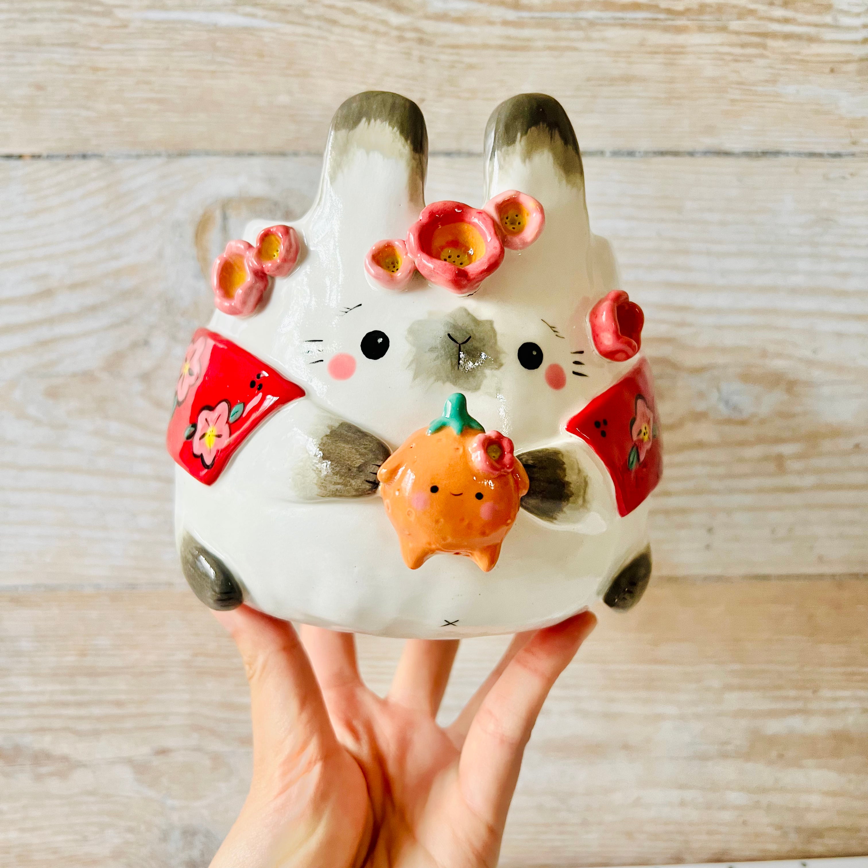 LNY CAPE WEARING Bunny pot with mandarin friend