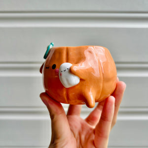 Small Halloween pumpkin pot with ghost friend