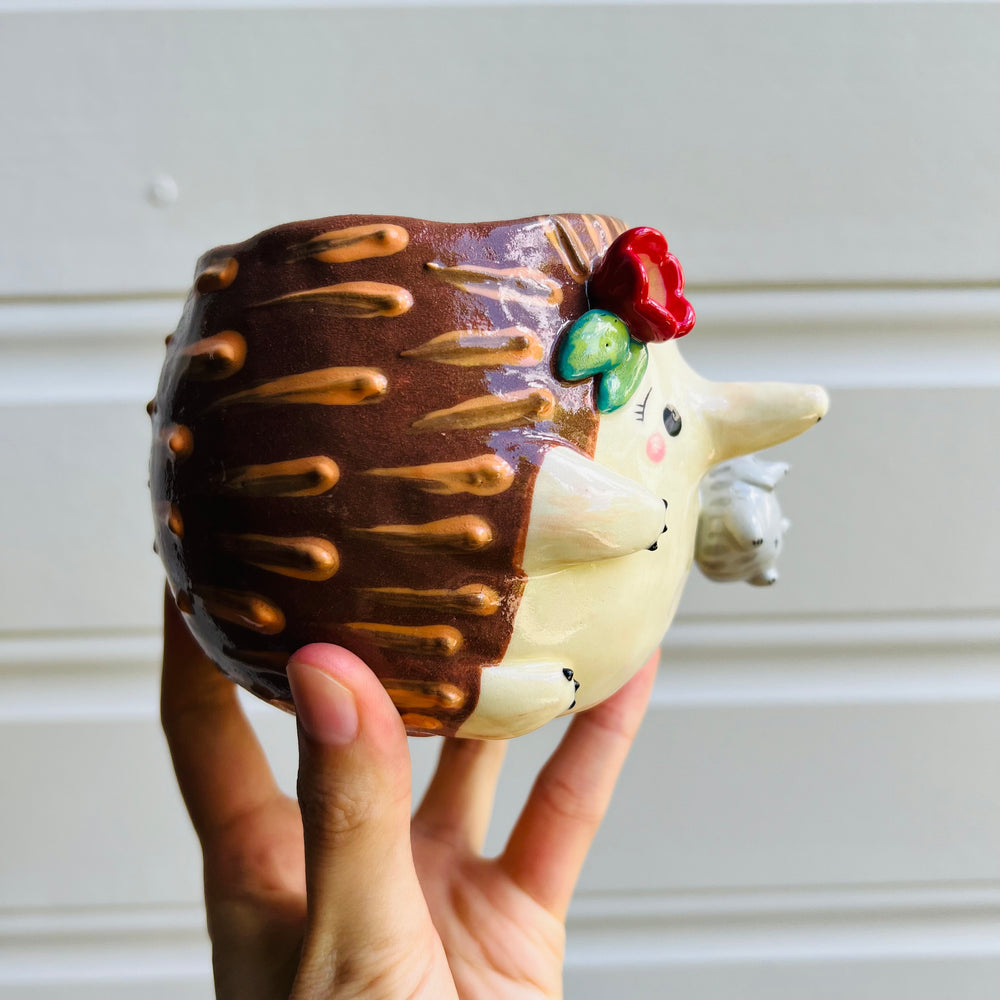 Flowery Echidna pot with Puggle baby, photo 2 of 5