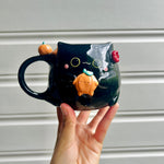 Halloween black cat mug with pumpkin friends