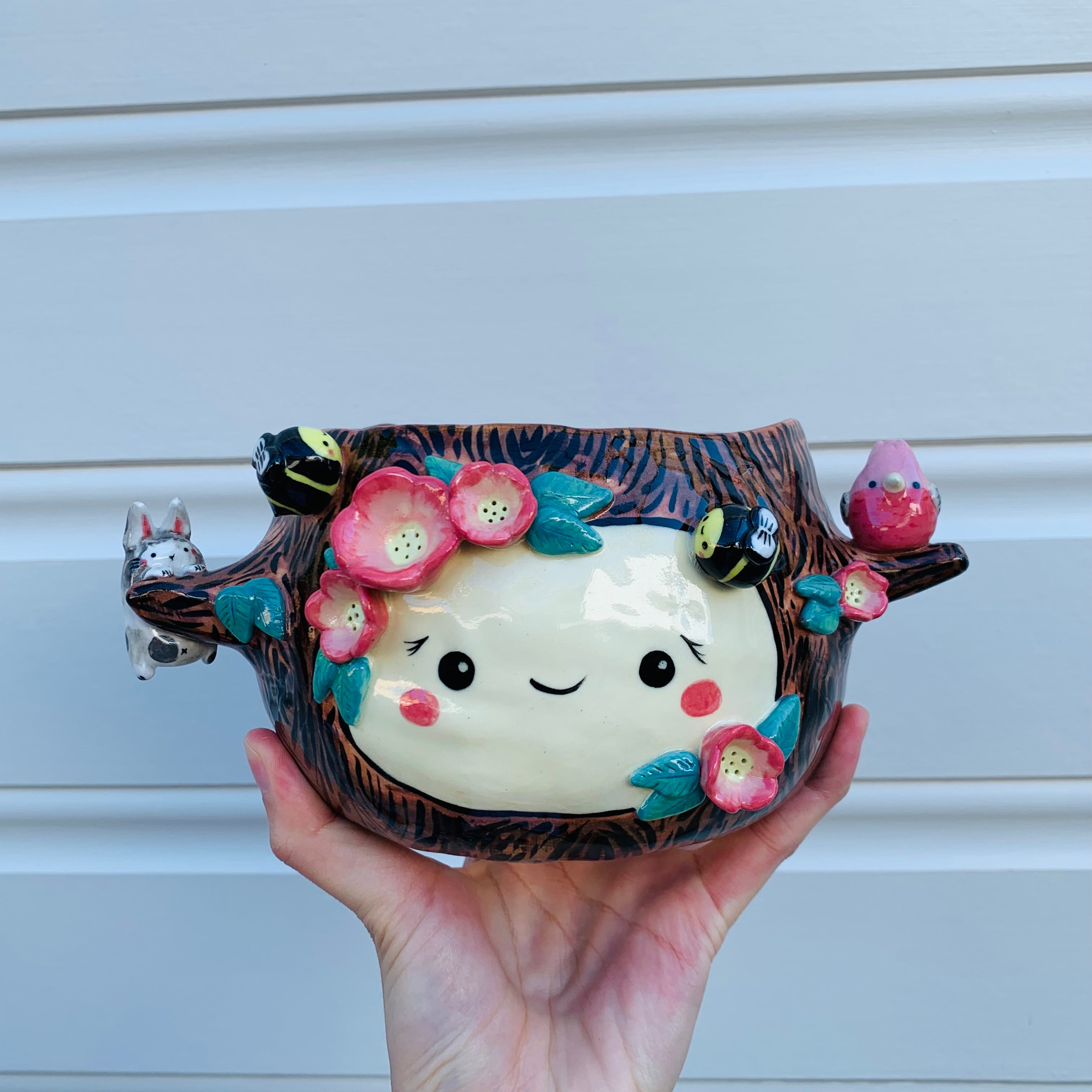 Happy flowery tree with bees, bunny and pink galah planter