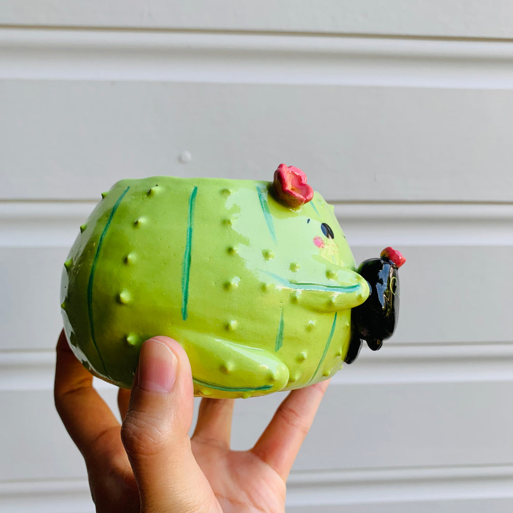 Flowery cactus pot with black cat friend, photo 2 of 6