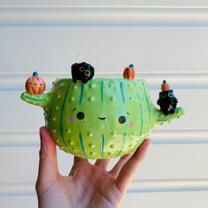 Pumpkin cactus pot with black cat friends