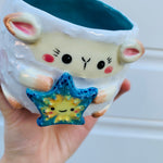 Small lamb planter with starfish friend planter