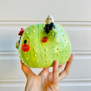 Flowery cactus pot with black cat and dumpling friends