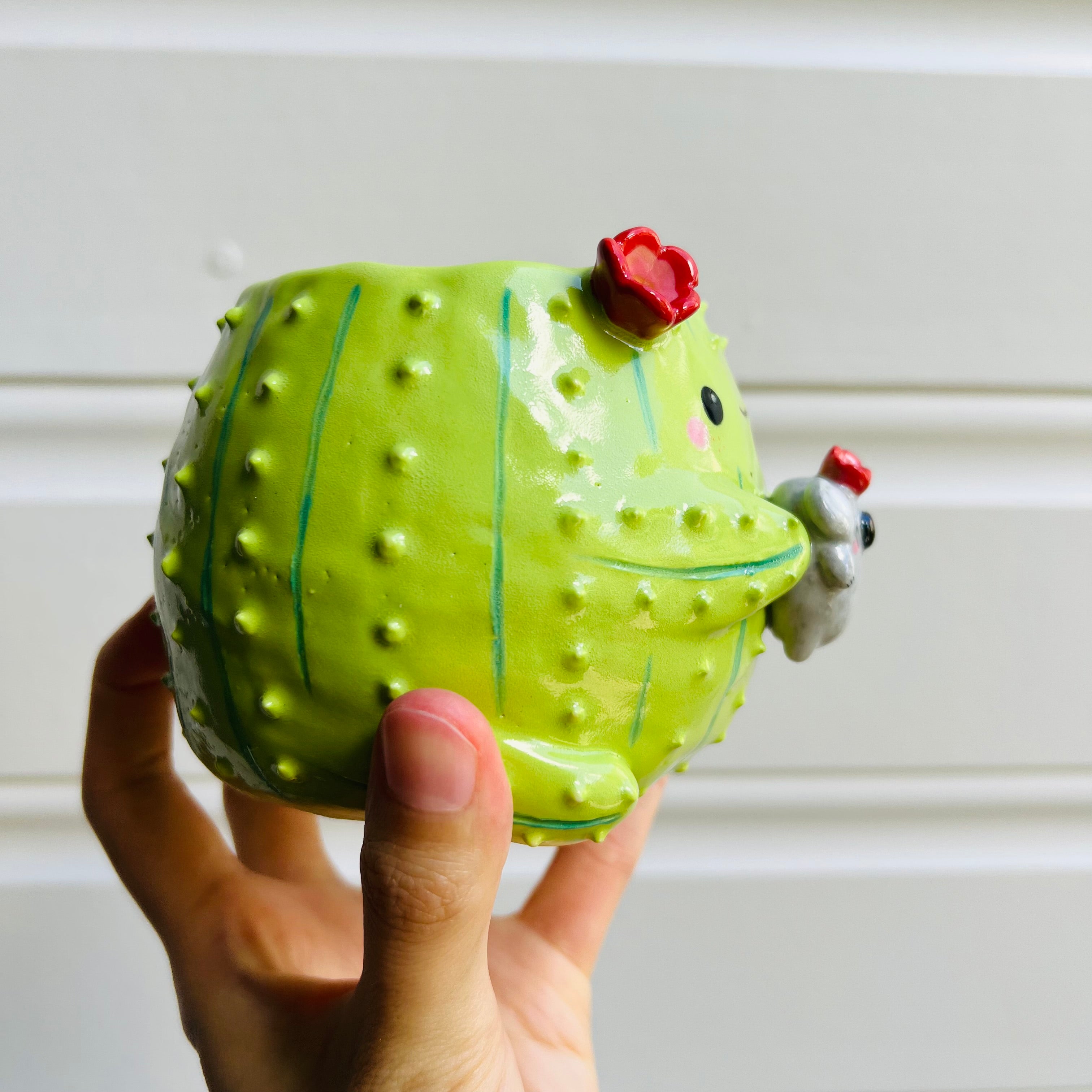 SECONDS: Flowery cactus pot with koala friend