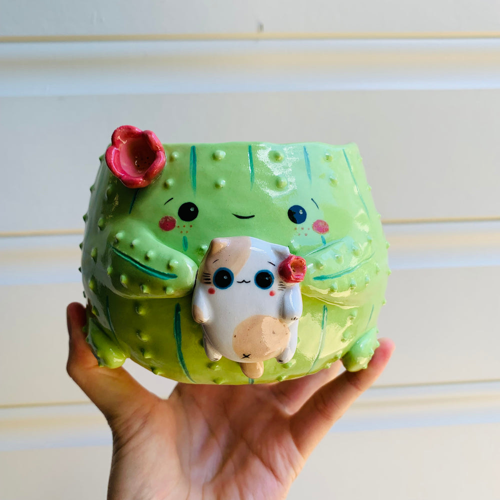 Flowery cactus pot with cat friend, photo 1 of 9