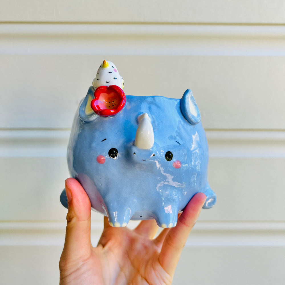 Rhino pot with egret friend, photo 1 of 5